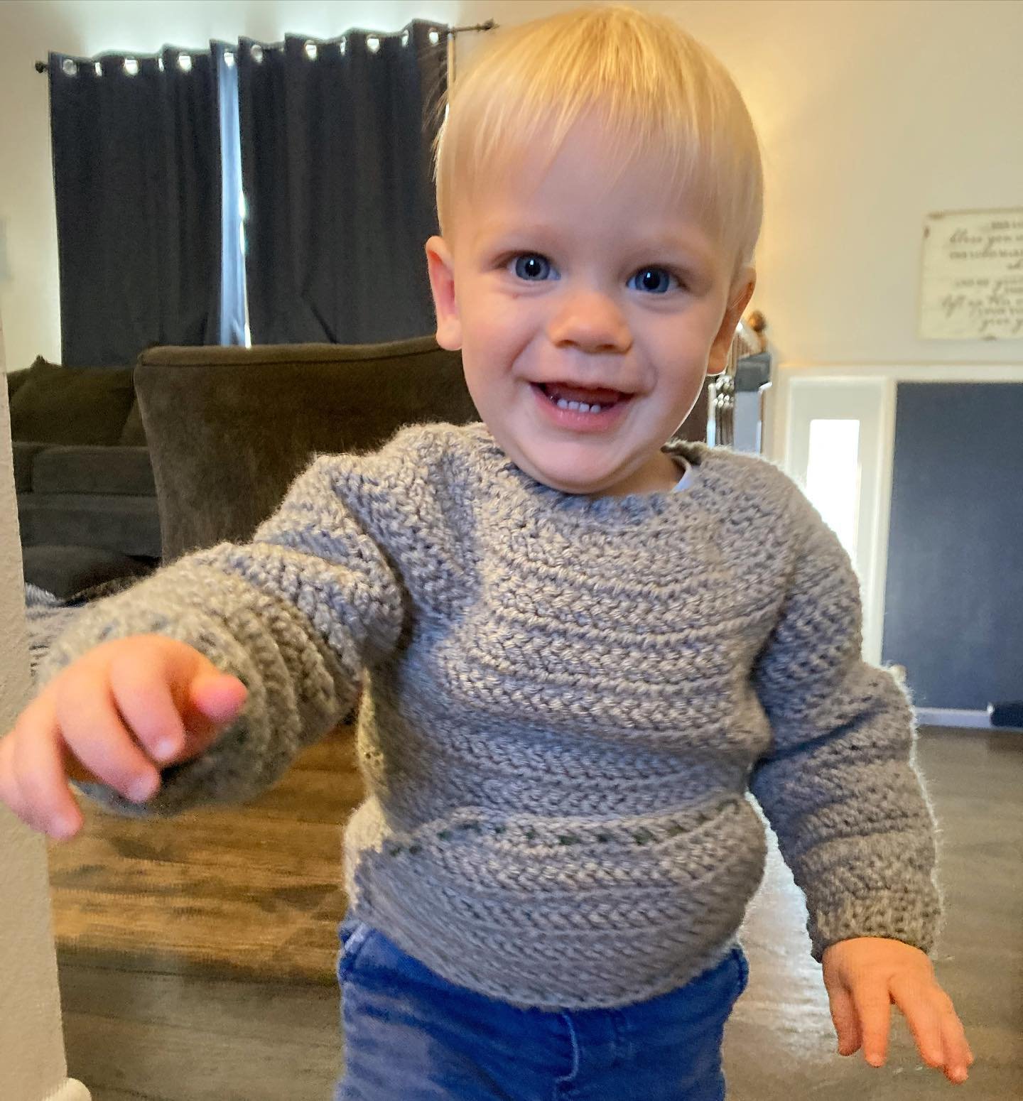 This little guy is so happy that mommy finished his Herrinbone Pullover! Isn’t he cute?! Oh, and the sweater, too. 😉